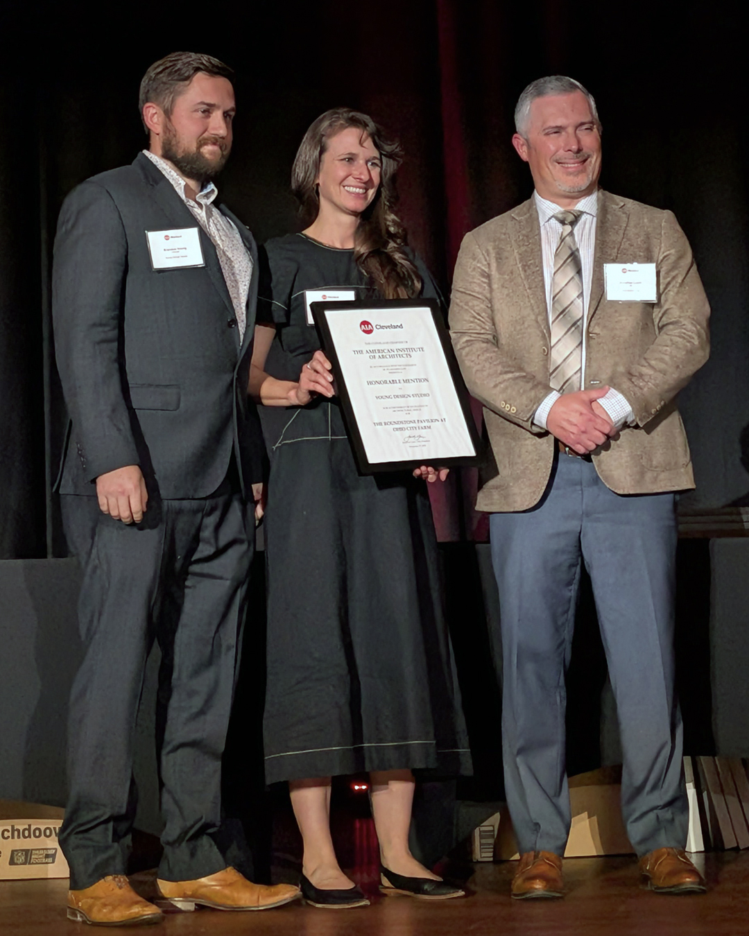 Brandon and Magdalina Young receiving the AIA Cleveland Honorable Mention for Roundstone Pavilion